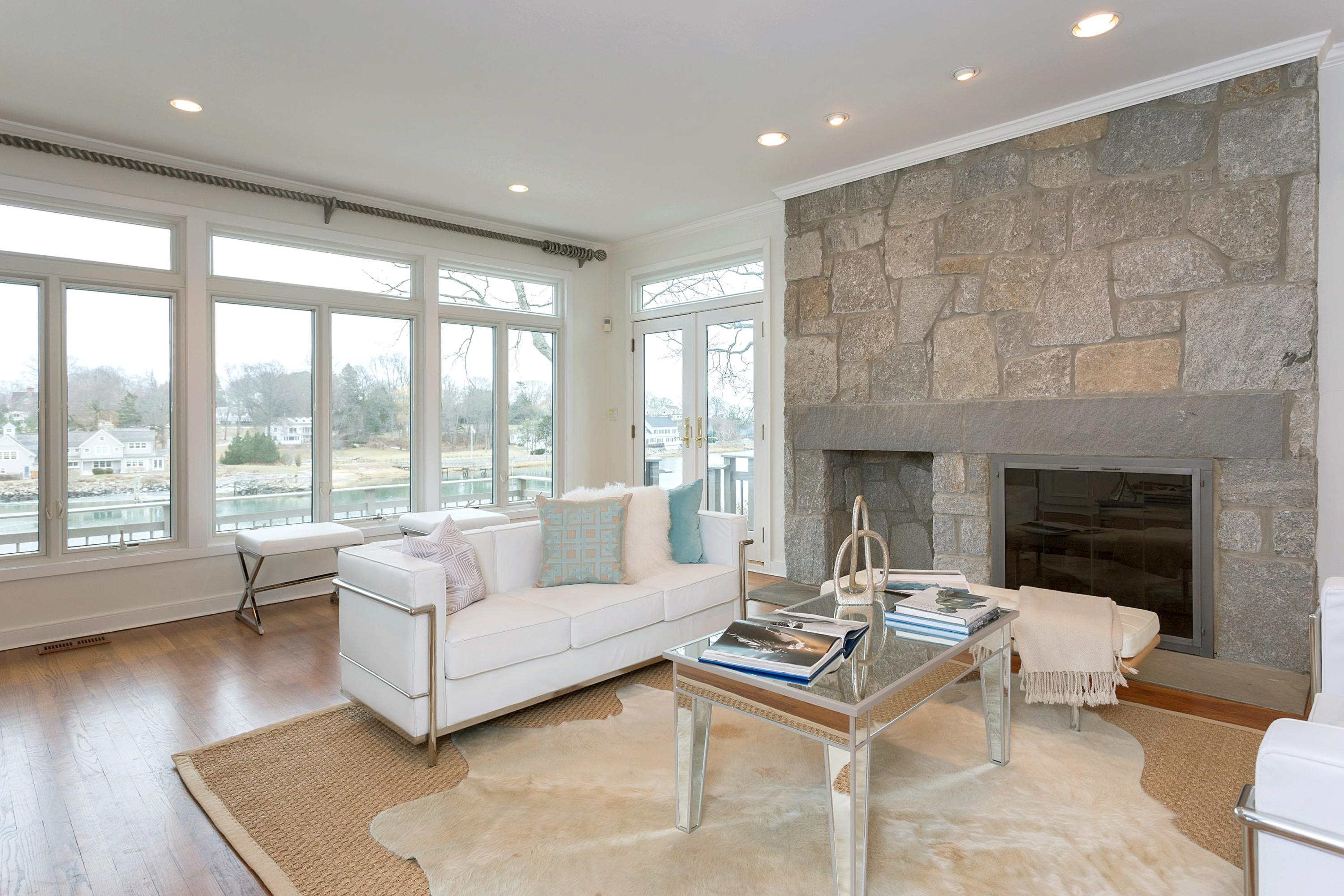 17 Thomas Place Rowayton, CT 06853 - Photo 7 of 37 a living room with furniture and a fireplace