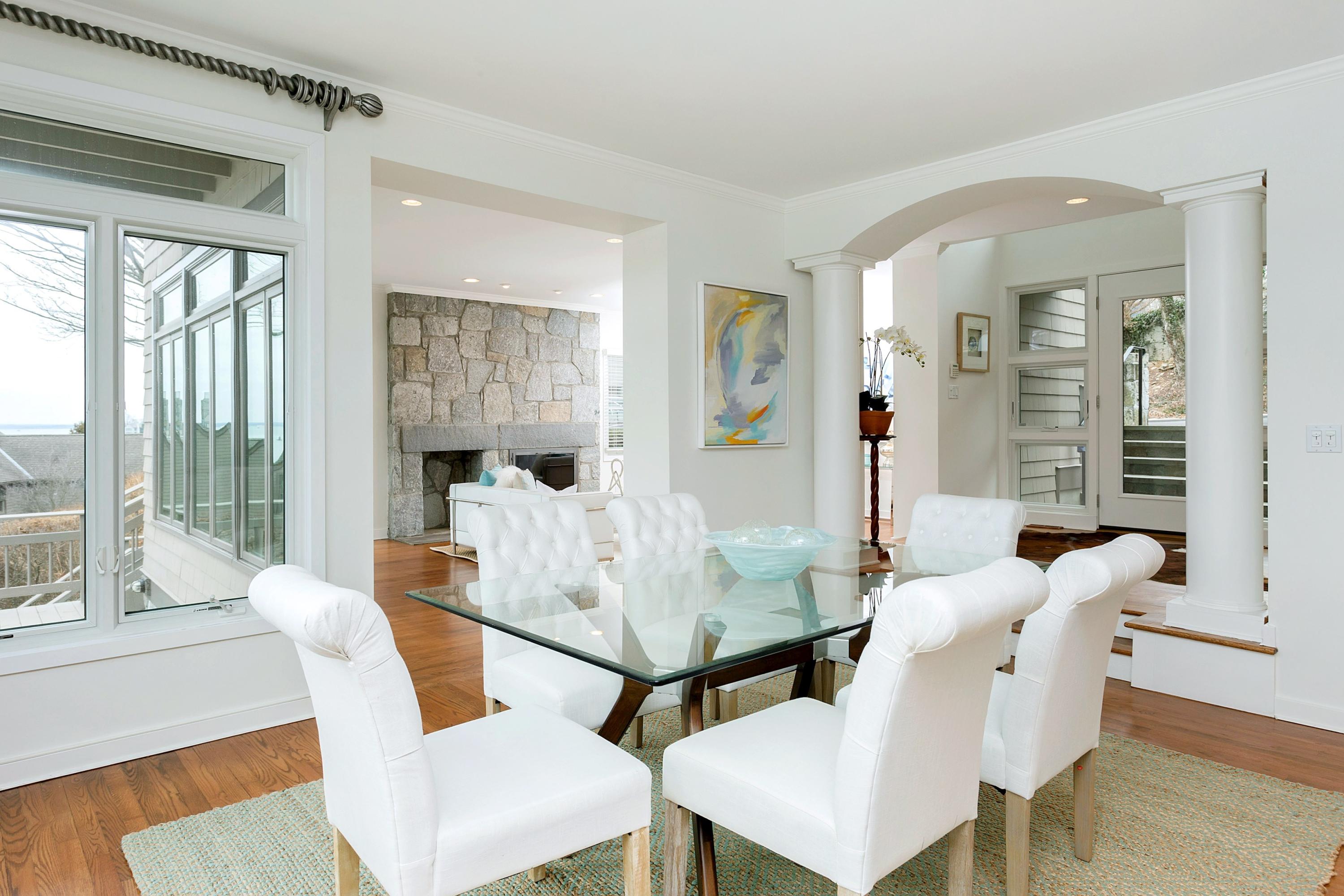 17 Thomas Place Rowayton, CT 06853 - Photo 10 of 37 a dining room with furniture and wooden floor