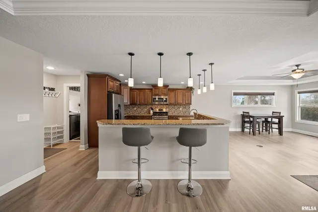 a kitchen with a stove and a sink