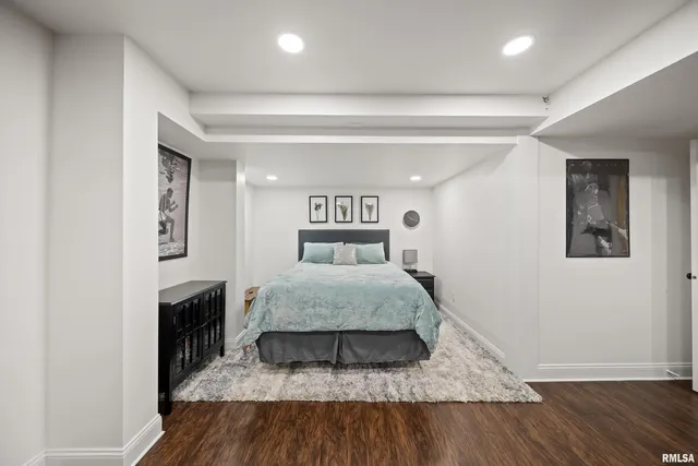 a bathroom with a toilet a sink and shower