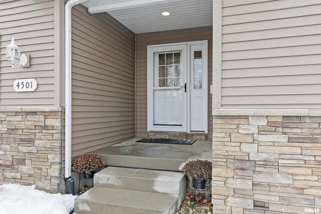 a bathroom with a toilet and shower