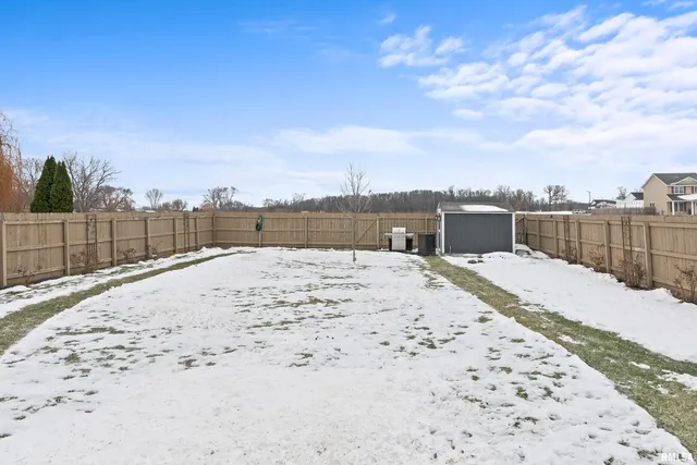 a front view of a house with parking space