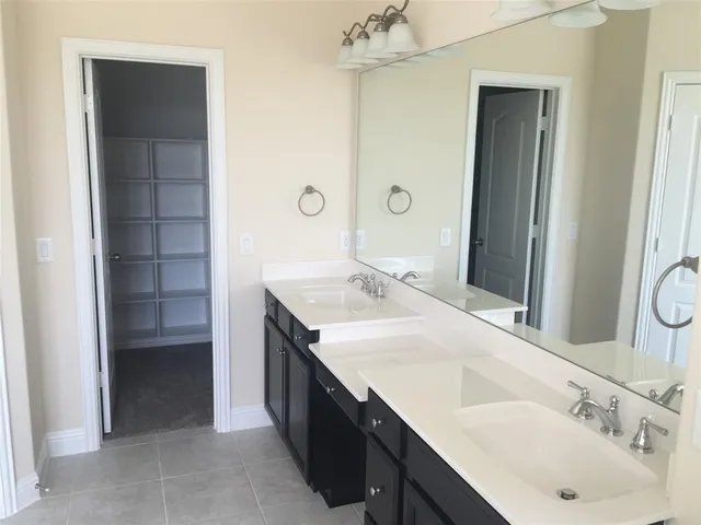 a bathroom with a shower and toilet