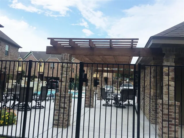 a view of balcony with wooden floor