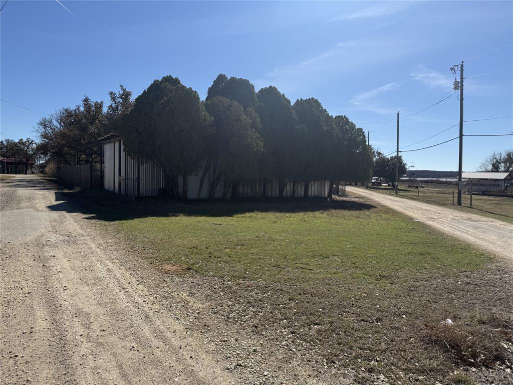 Tbd Bounding Main Drive May, TX 76857 - Photo 8 of 8 a view of a yard with a house