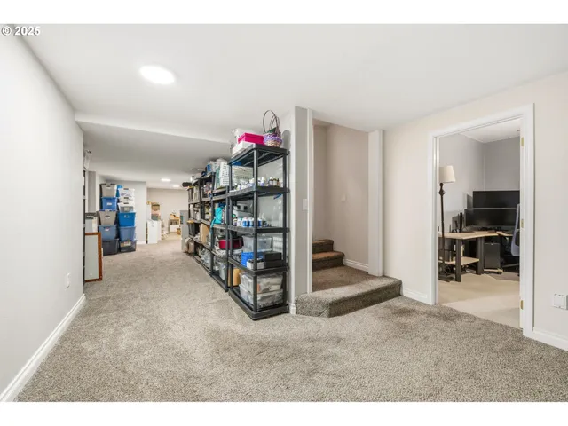 a view of a livingroom with furniture and a rug