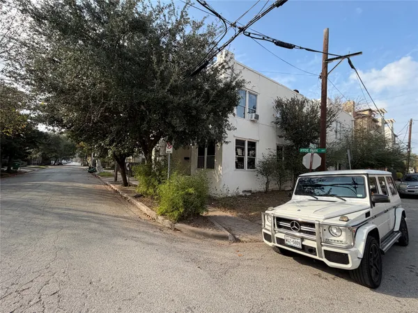 a car parked in front of a house