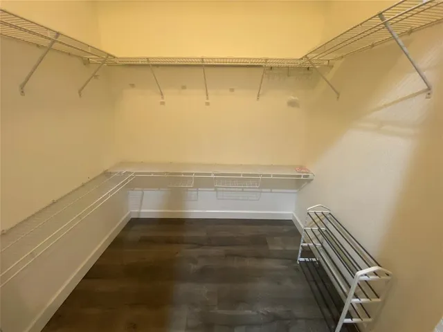 a view of hallway with shower