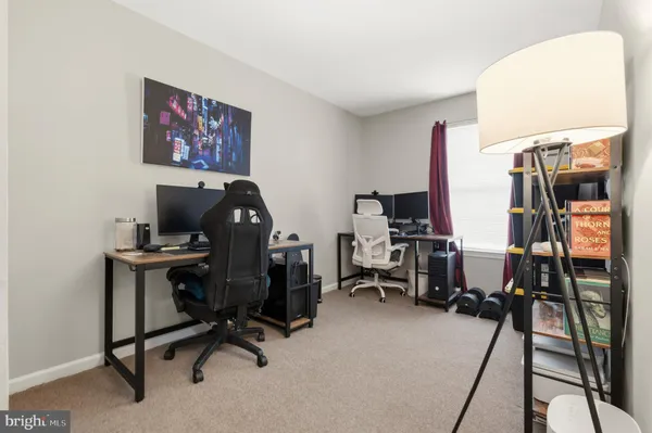 a view of a workspace with furniture