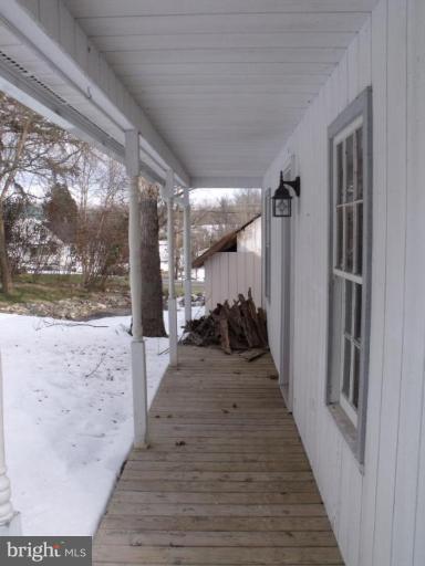 26038 Frederick Road Clarksburg, MD 20871 - Photo 26 of 27 Workshop porch.