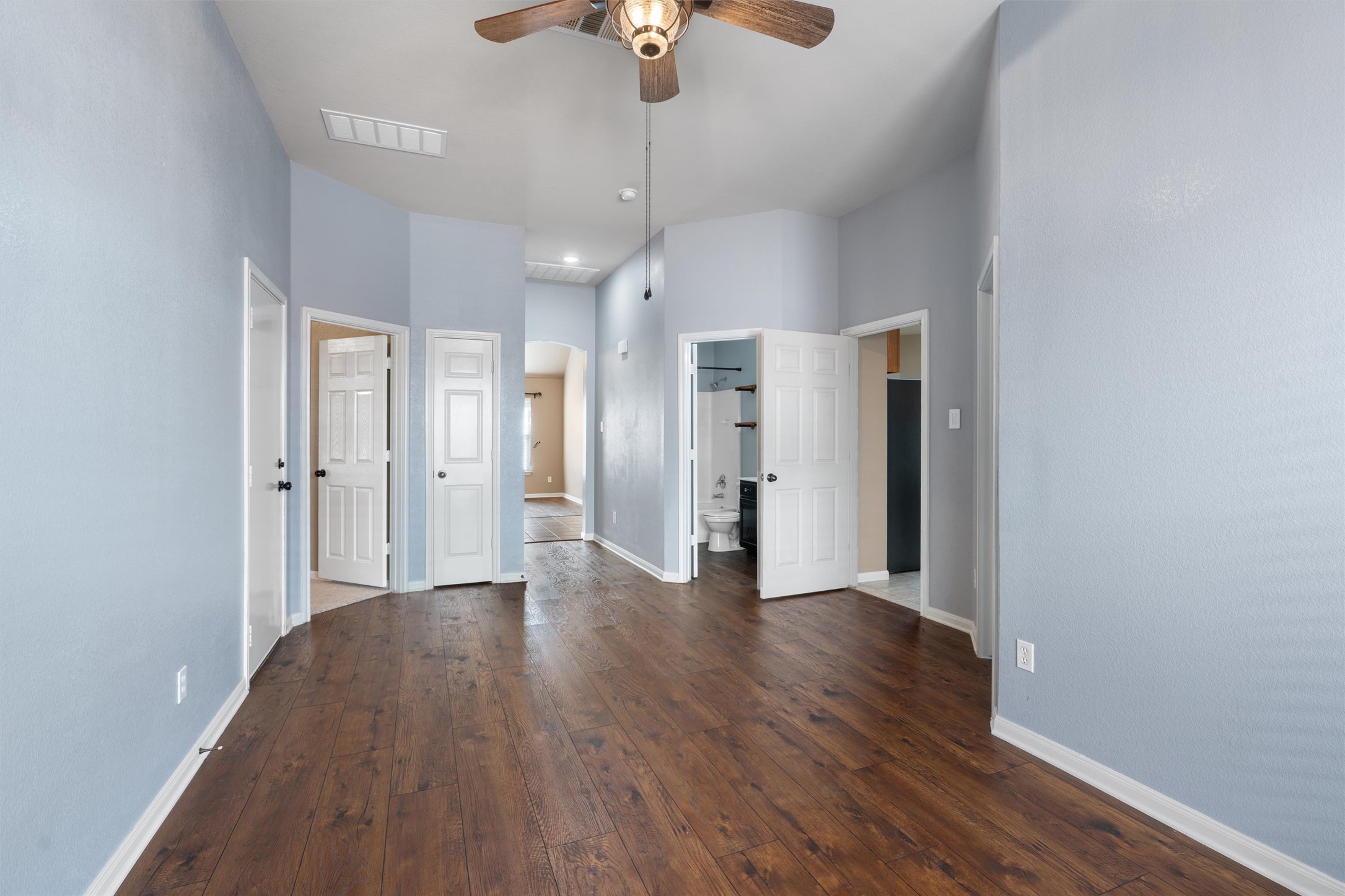 407 Red Hawk Drive Leander, TX 78641 - Photo 23 of 34 a view of a hallway with wooden floor