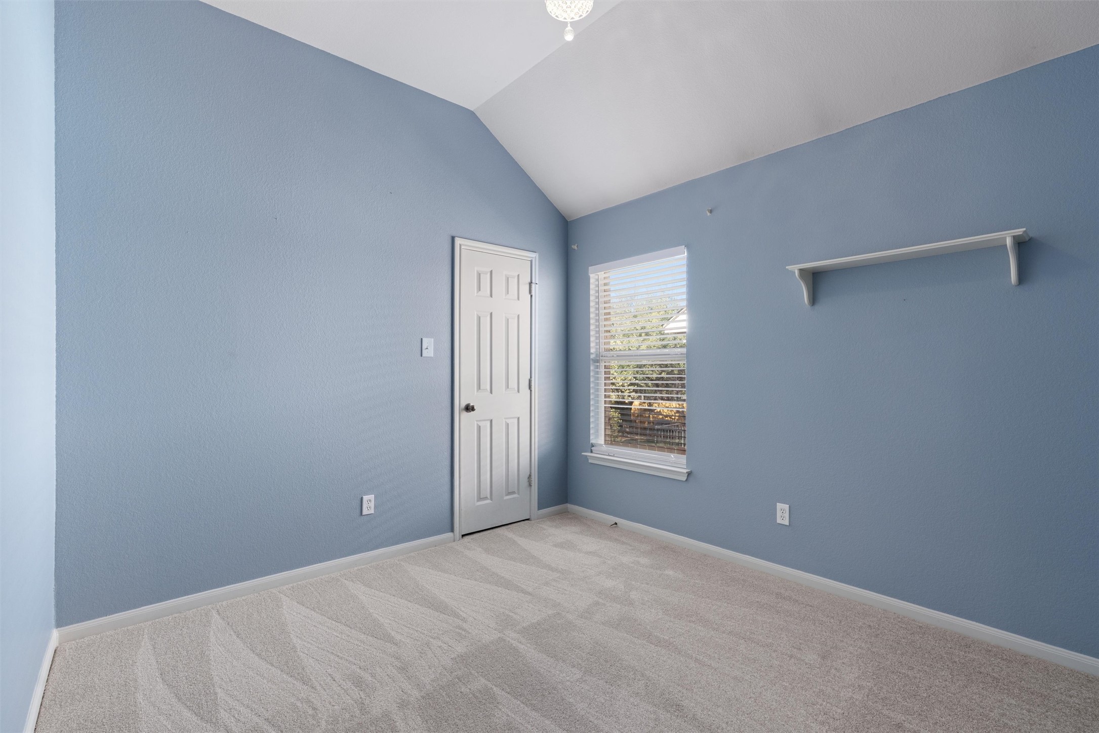 407 Red Hawk Drive Leander, TX 78641 - Photo 25 of 34 a view of an empty room with a window