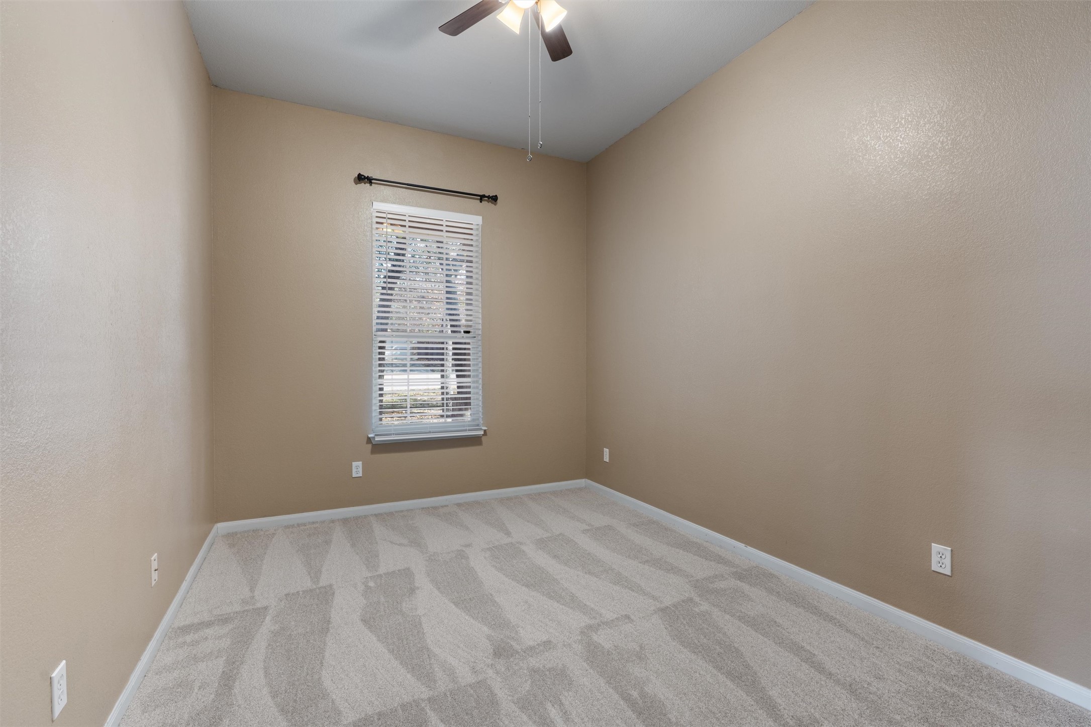 407 Red Hawk Drive Leander, TX 78641 - Photo 27 of 34 a view of an empty room with a window