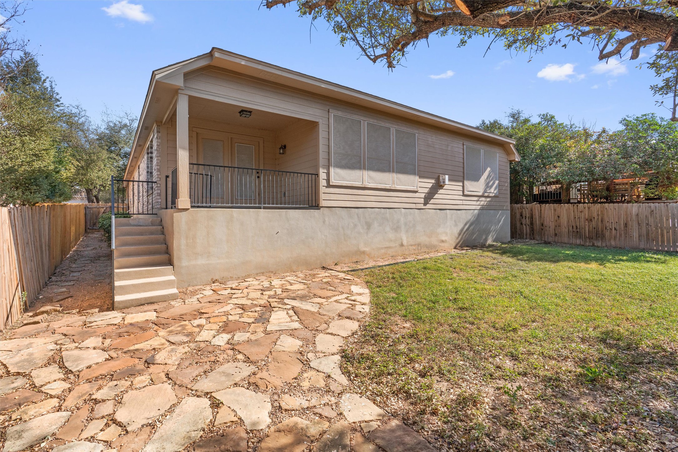 407 Red Hawk Drive Leander, TX 78641 - Photo 32 of 34 a front view of a house with a yard