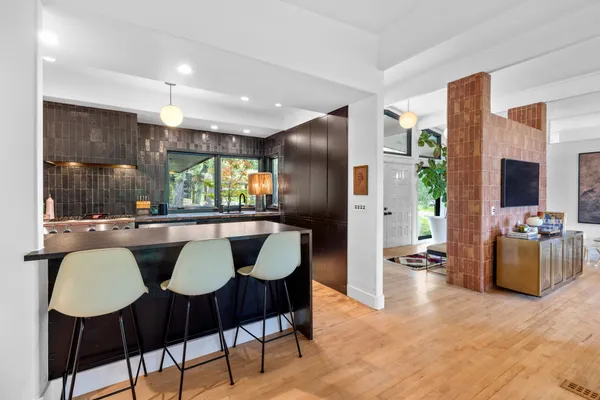 a view of a dining room with furniture