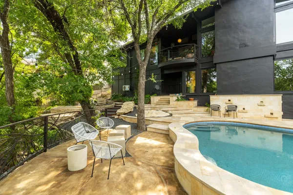 a view of a swimming pool with an outdoor space
