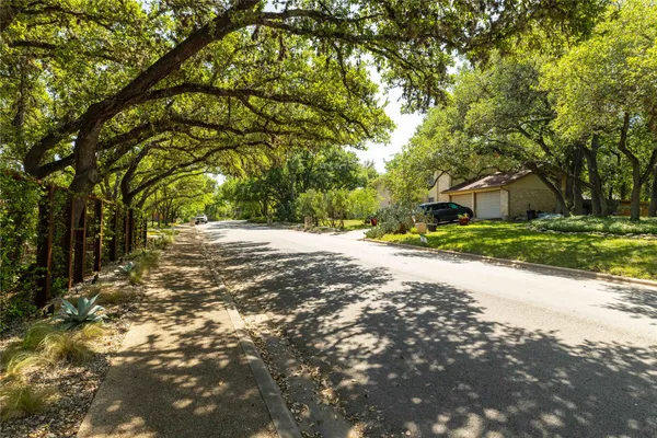 a view of road with trees