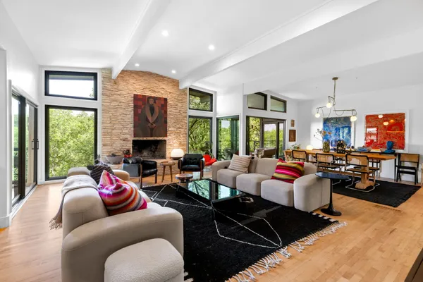 a living room with furniture or couch and a flat screen tv