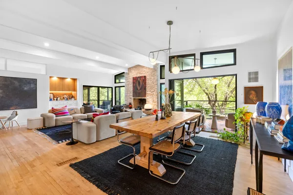 a view of a dining room with furniture window and wooden floor