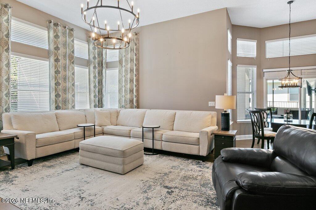 841 Ifield Road St. Augustine, FL 32095 - Photo 23 of 69 a living room with furniture and a large window