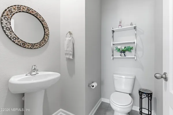 a bathroom with a sink and a toilet