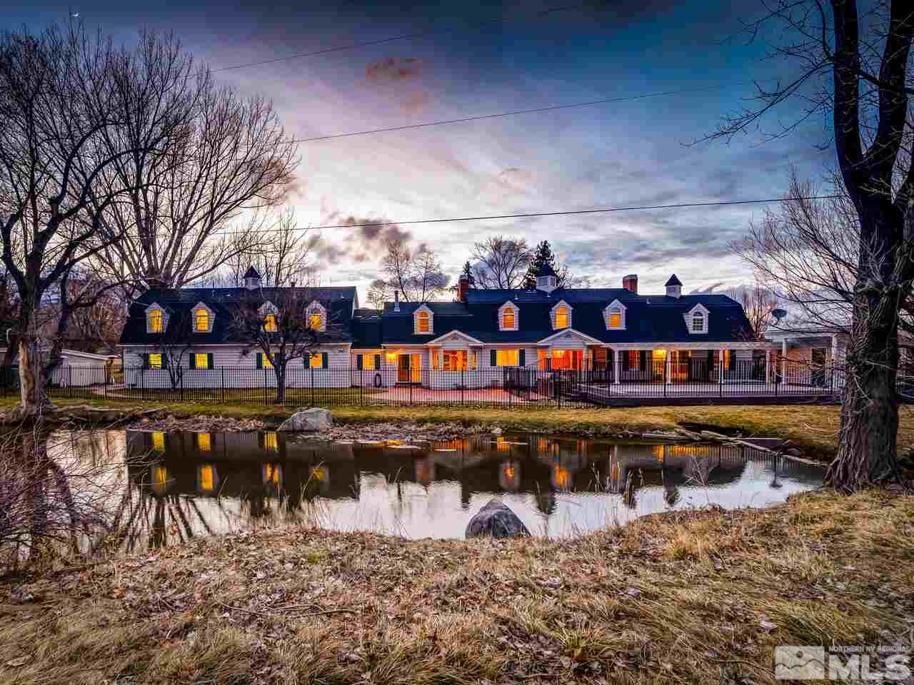 a view of a lake with a house