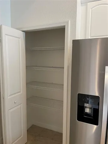 a room with storage and utility