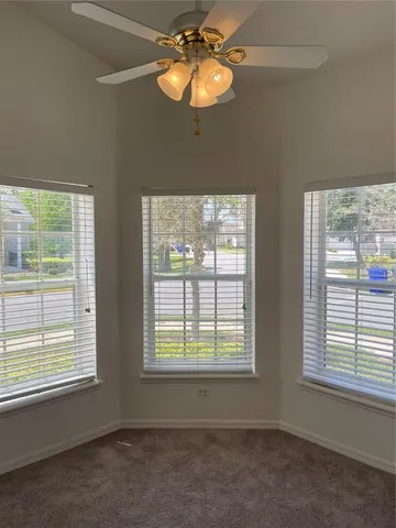 a decorative lighting in a room next to a window