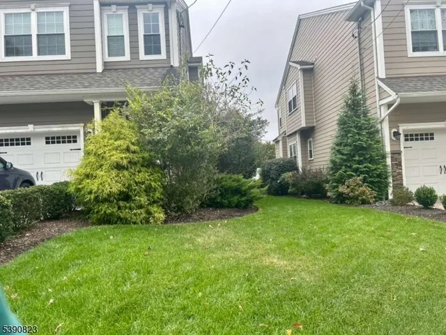 a view of a back yard of the house