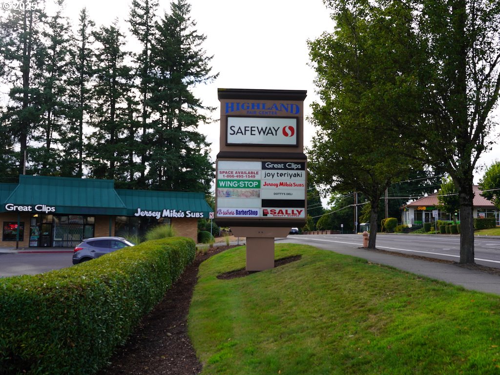 4434 West Powell Boulevard Gresham, OR 97030 - Photo 2 of 9 a sign board with a play ground in the back