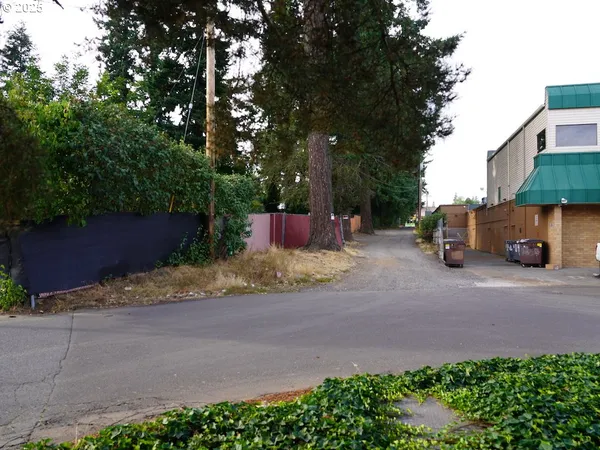 a view of street and with car parked