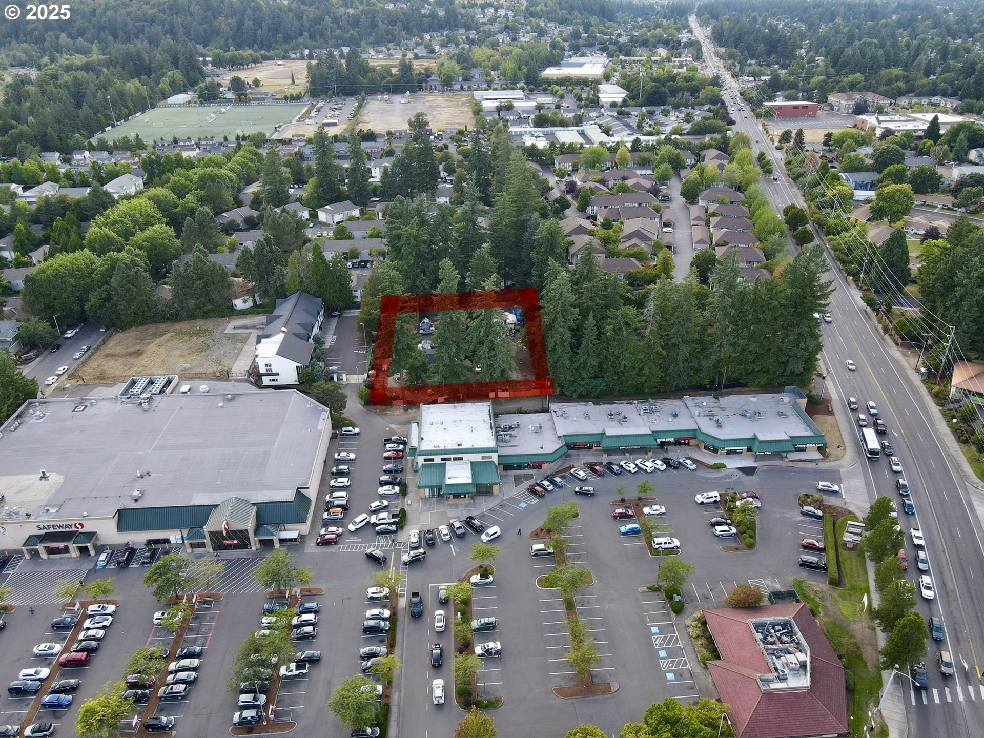 4434 West Powell Boulevard Gresham, OR 97030 - Photo 7 of 9 an aerial view of residential houses with outdoor space