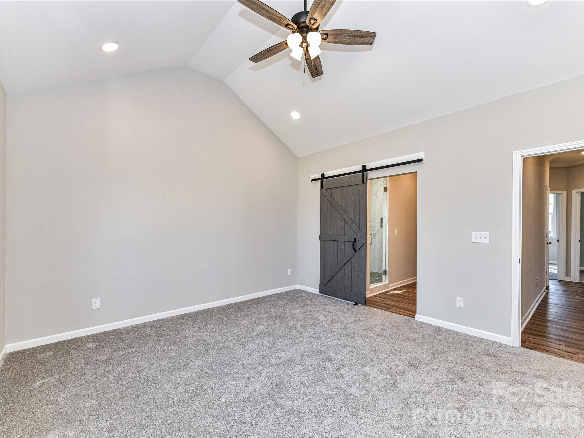 104 Poplar Street Clover, SC 29710 - Photo 17 of 33 an empty room with closet and fan