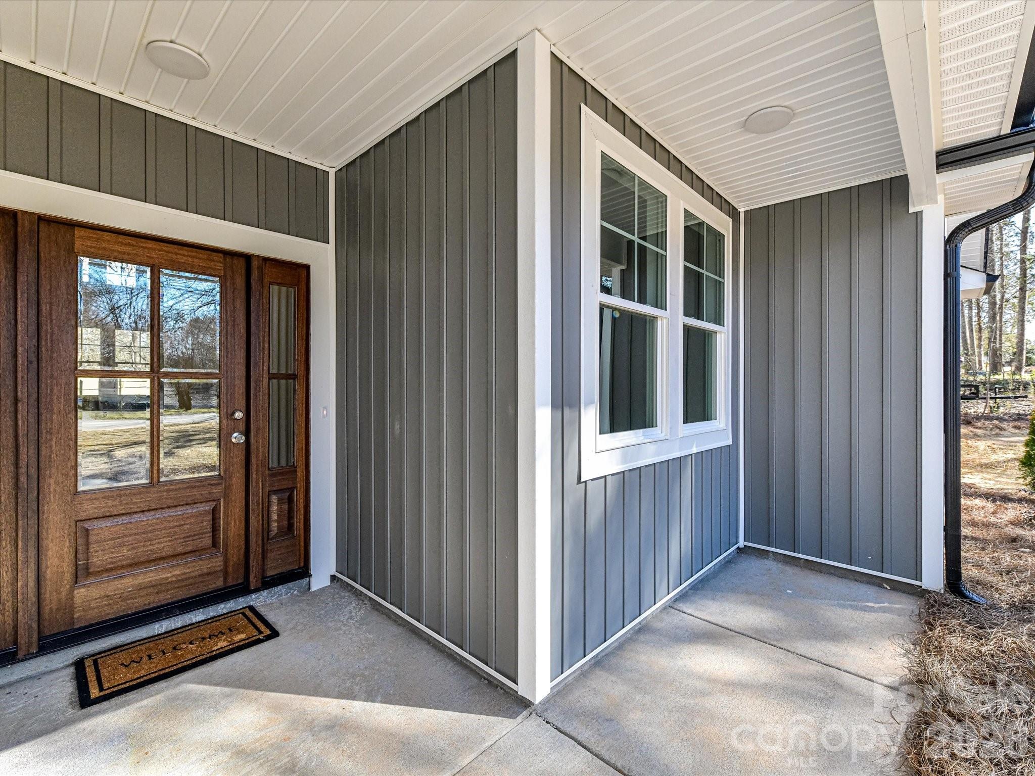 104 Poplar Street Clover, SC 29710 - Photo 2 of 33 a view of backyard with window and entryway