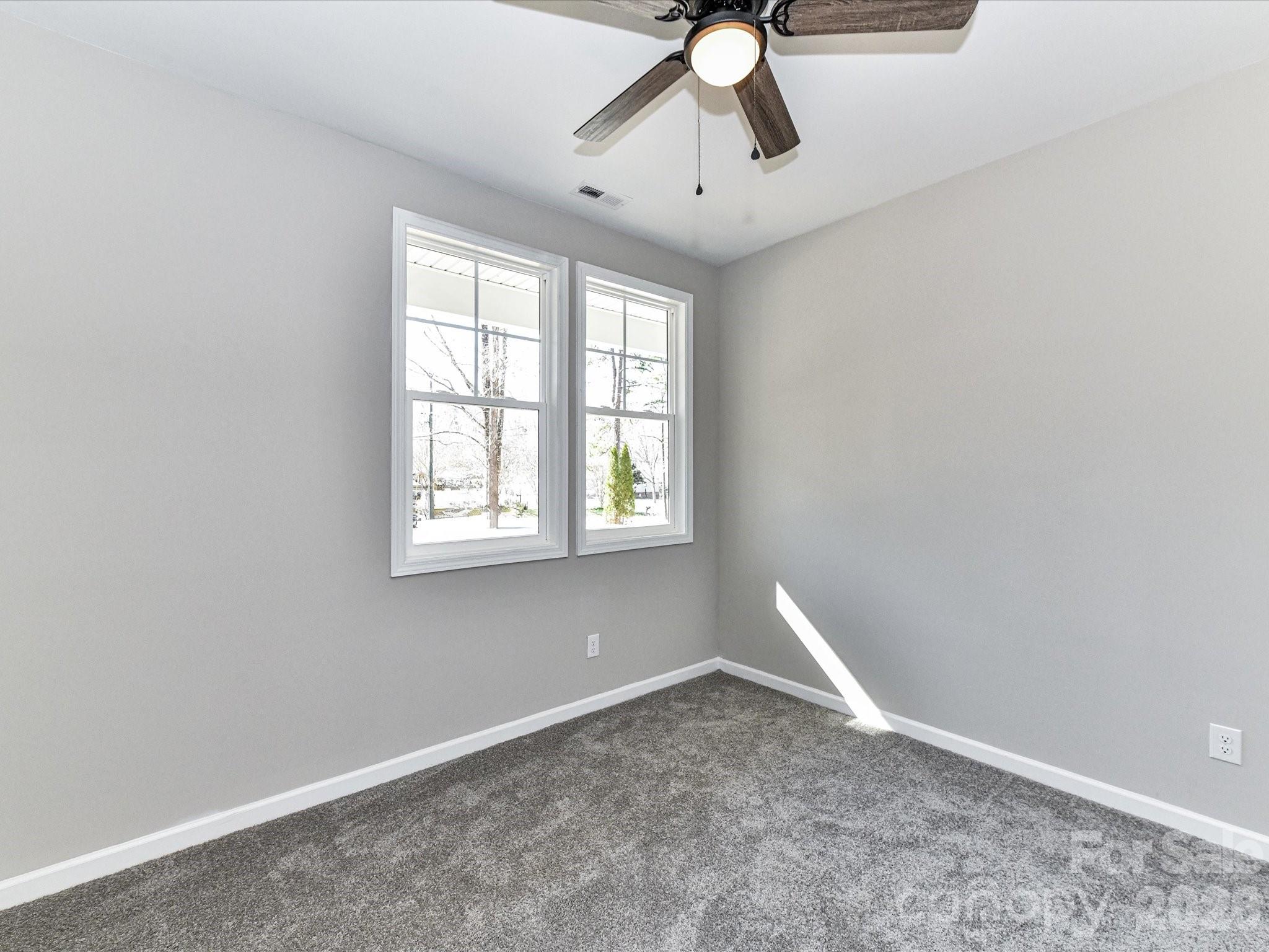 104 Poplar Street Clover, SC 29710 - Photo 24 of 33 an empty room with a window
