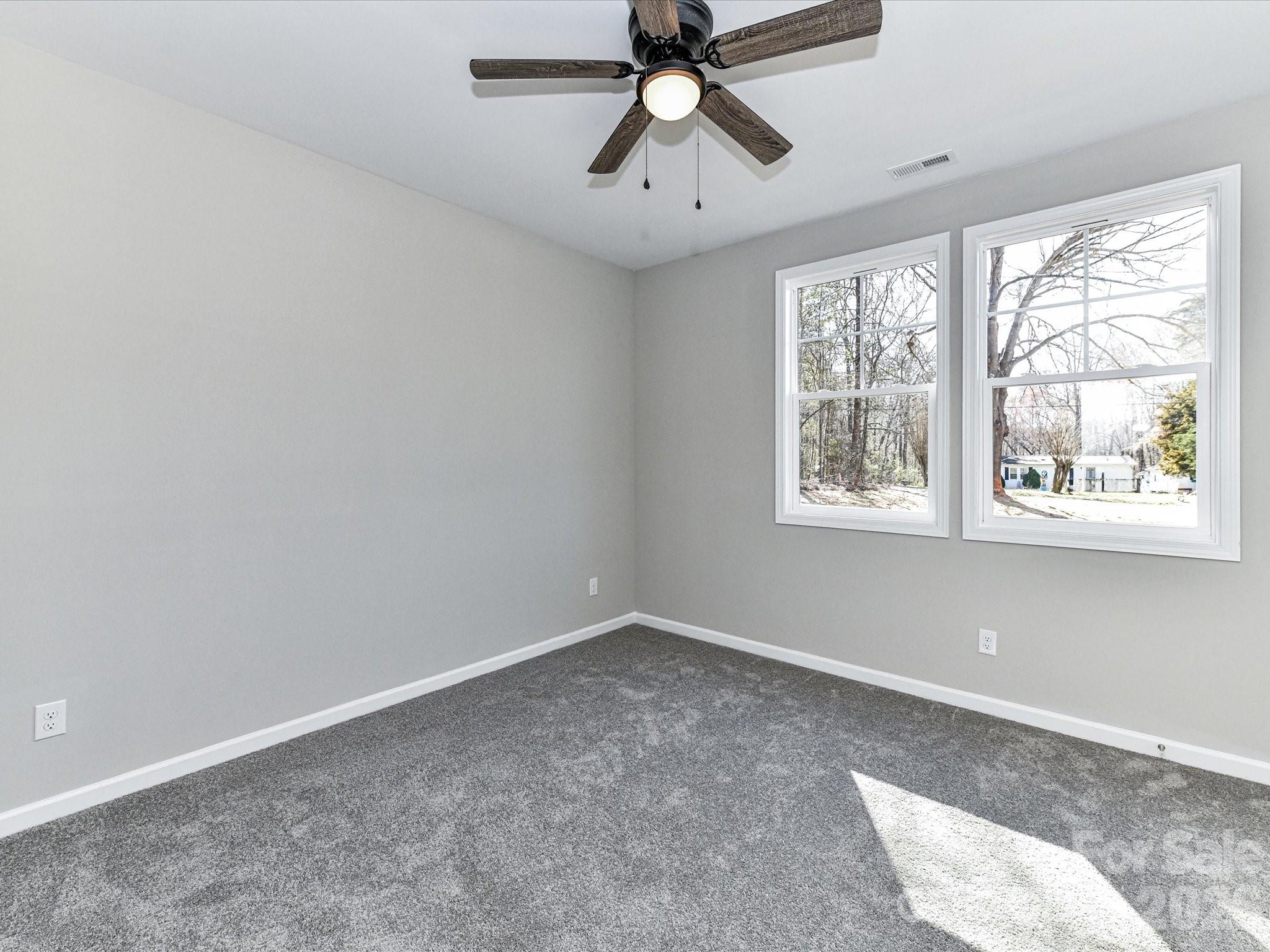 104 Poplar Street Clover, SC 29710 - Photo 27 of 33 a view of room with window and ceiling fan
