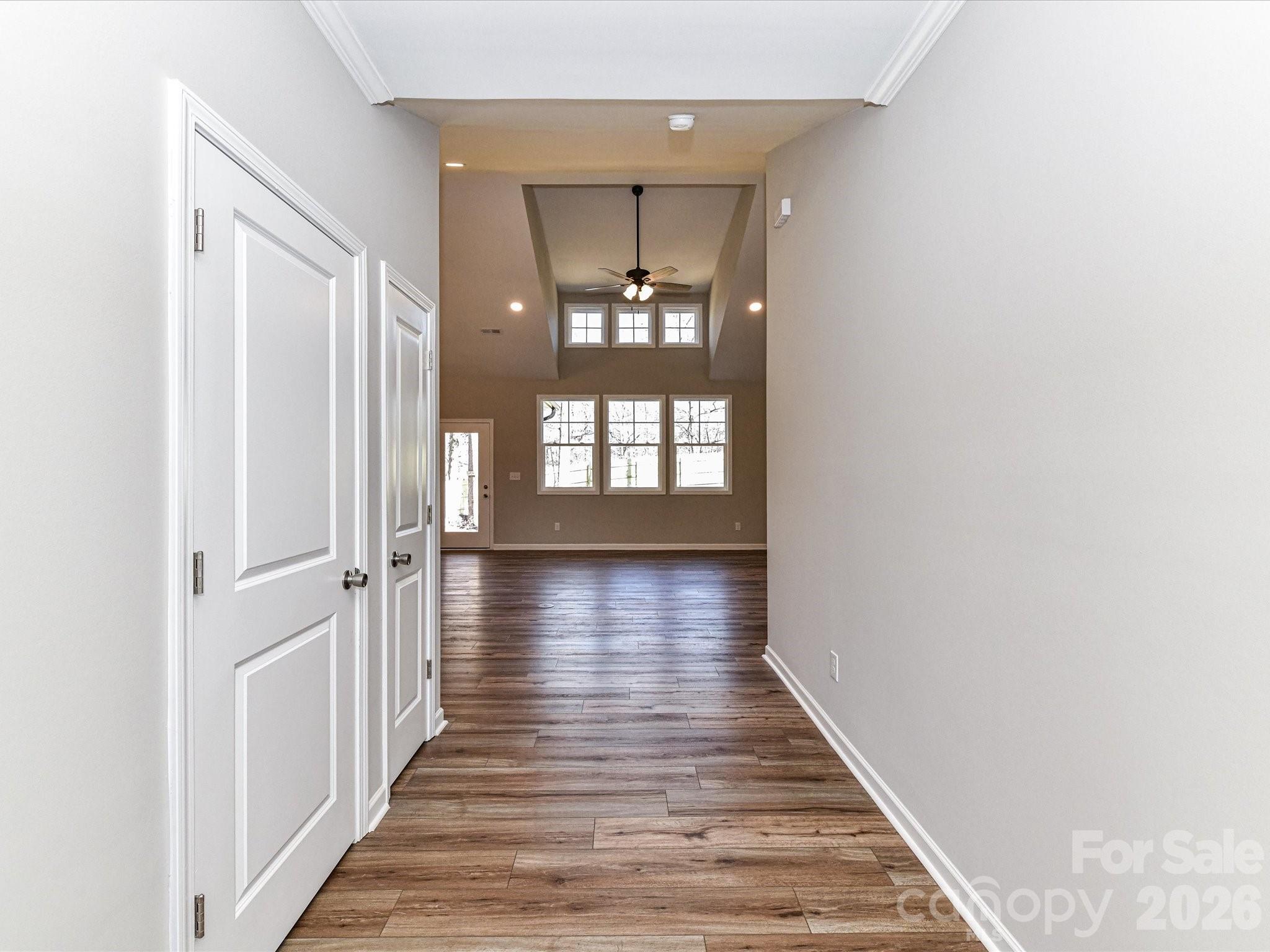 104 Poplar Street Clover, SC 29710 - Photo 3 of 33 a view of a hallway with wooden floor and staircase