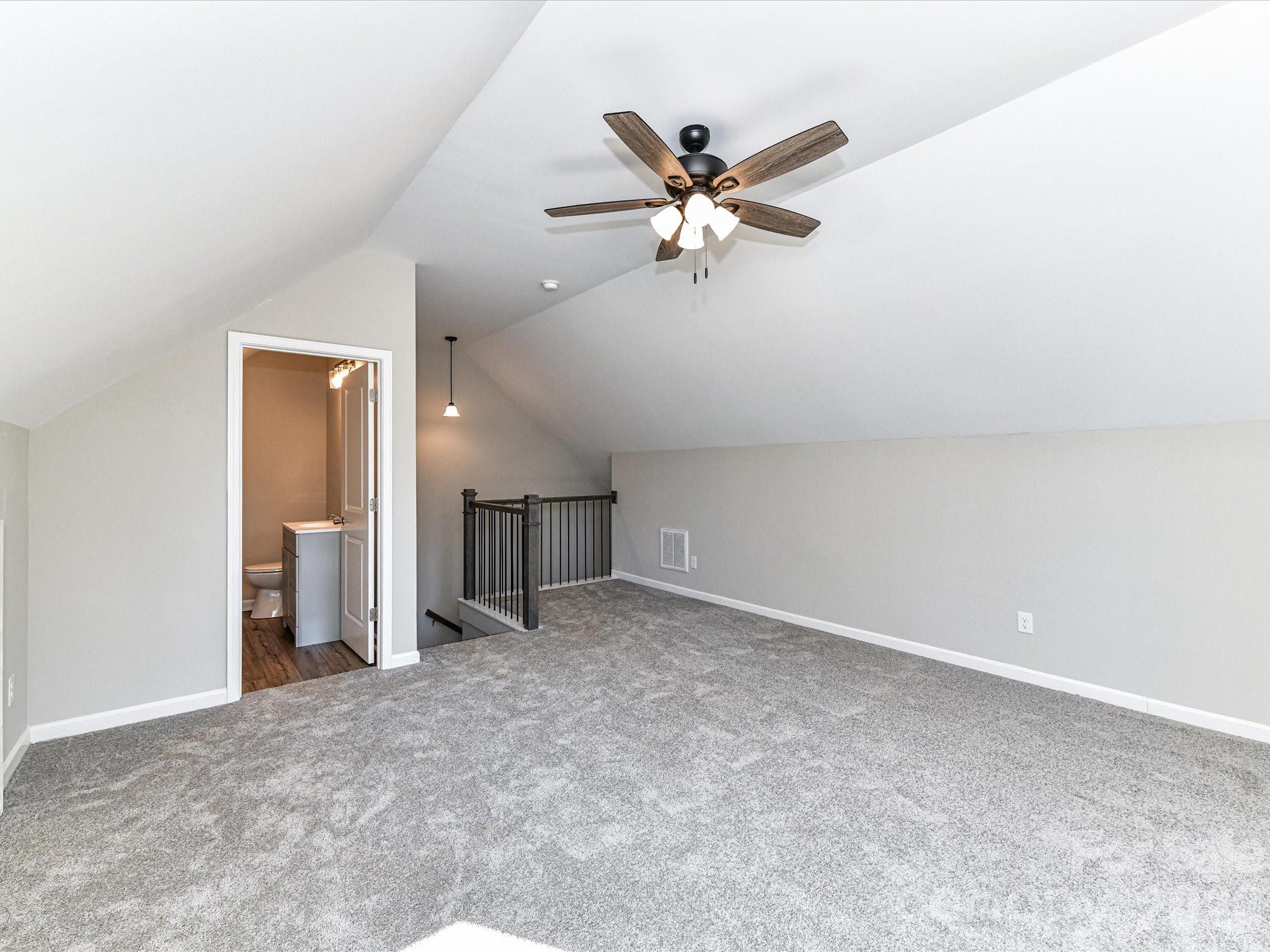 104 Poplar Street Clover, SC 29710 - Photo 31 of 33 a view of a livingroom with a ceiling fan and window