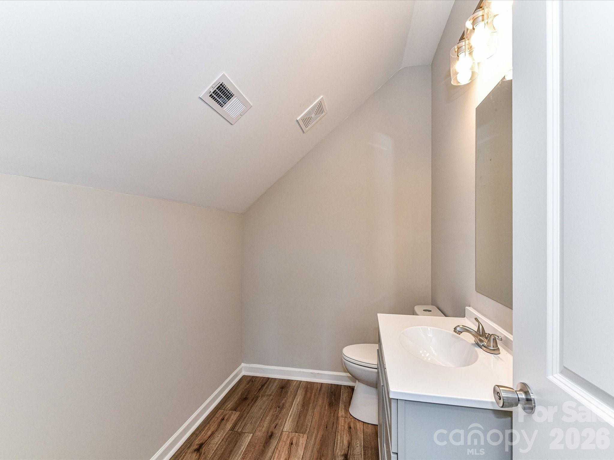 104 Poplar Street Clover, SC 29710 - Photo 32 of 33 a bathroom with a sink and a toilet