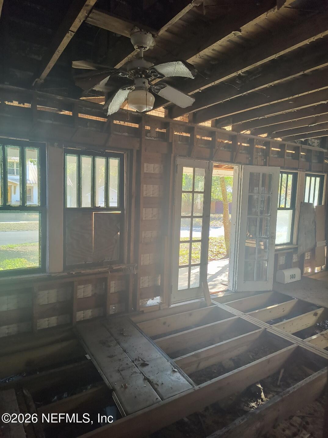 140 Citrus Avenue Keystone Heights, FL 32656 - Photo 25 of 26 a living room with a large window