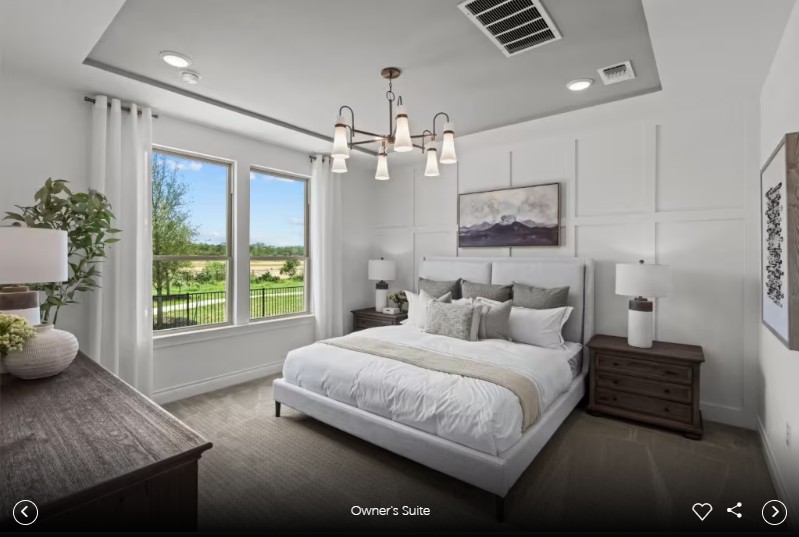 1000 Martingale Street Georgetown, TX 78633 - Photo 4 of 13 a spacious bedroom with a bed and a chandelier