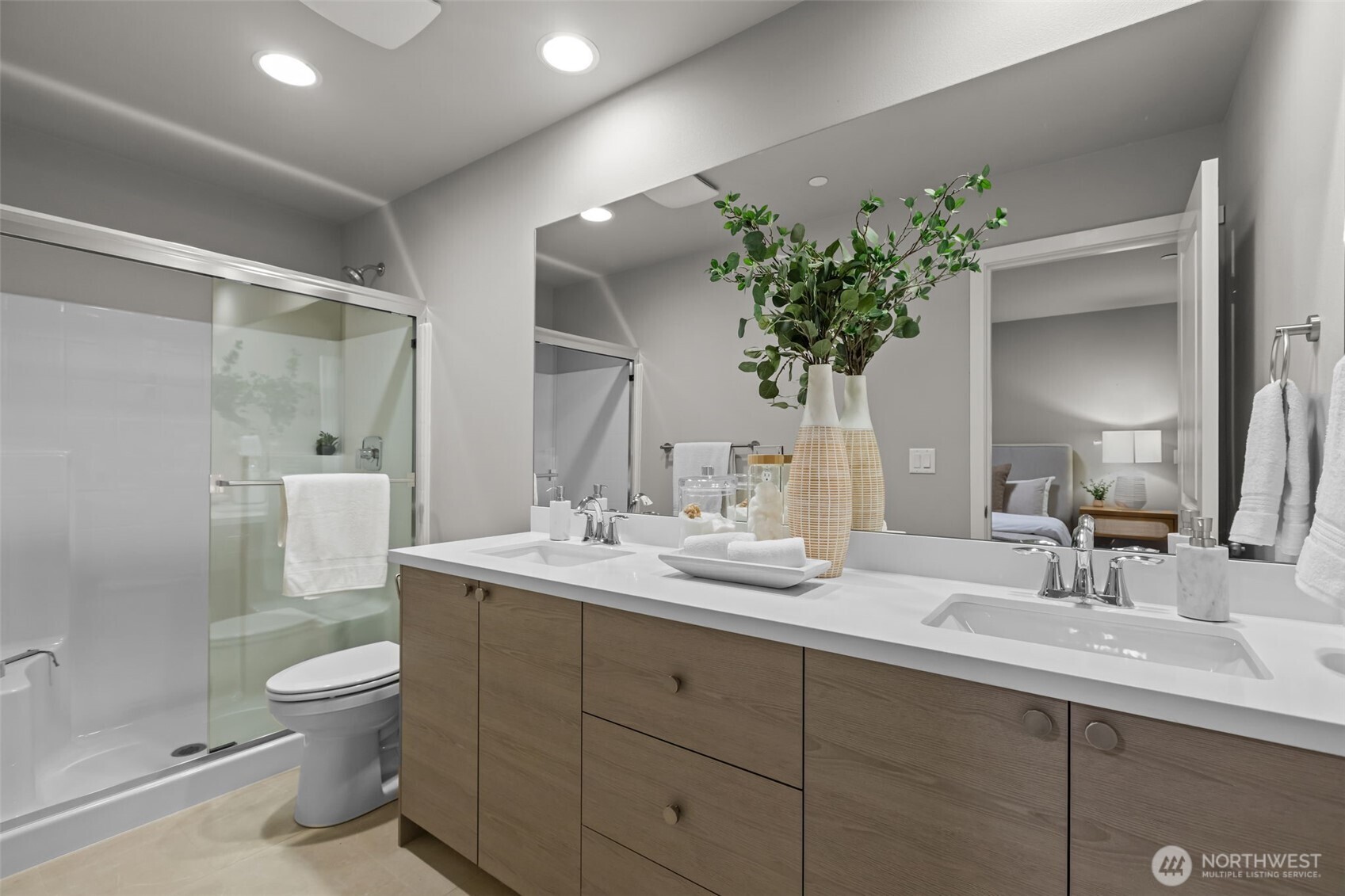122 169th Place Southwest, Unit A Bothell, WA 98012 - Photo 18 of 29 a bathroom with a toilet sink and mirror