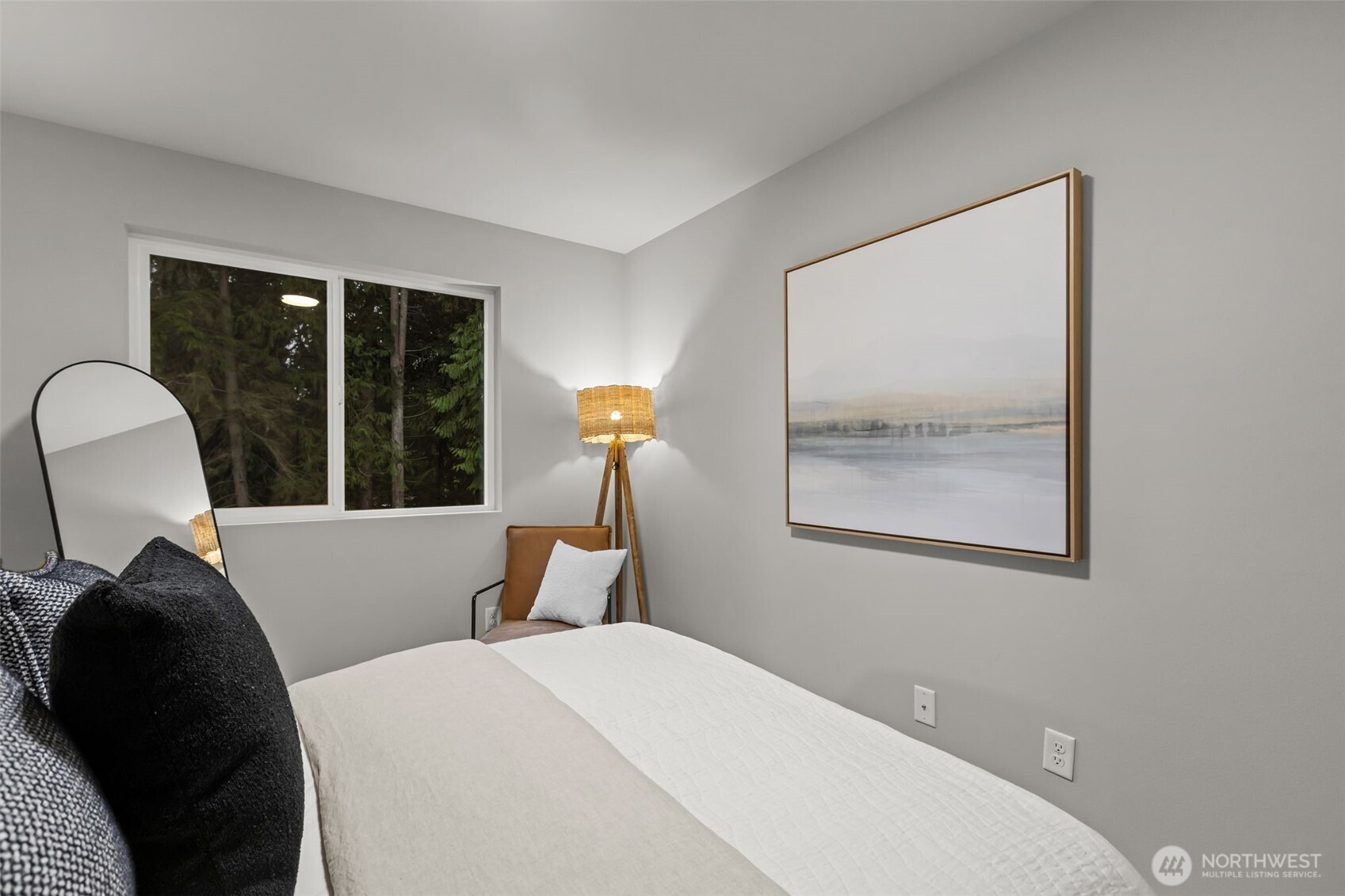 122 169th Place Southwest, Unit A Bothell, WA 98012 - Photo 20 of 29 a bedroom with a bed and a large window