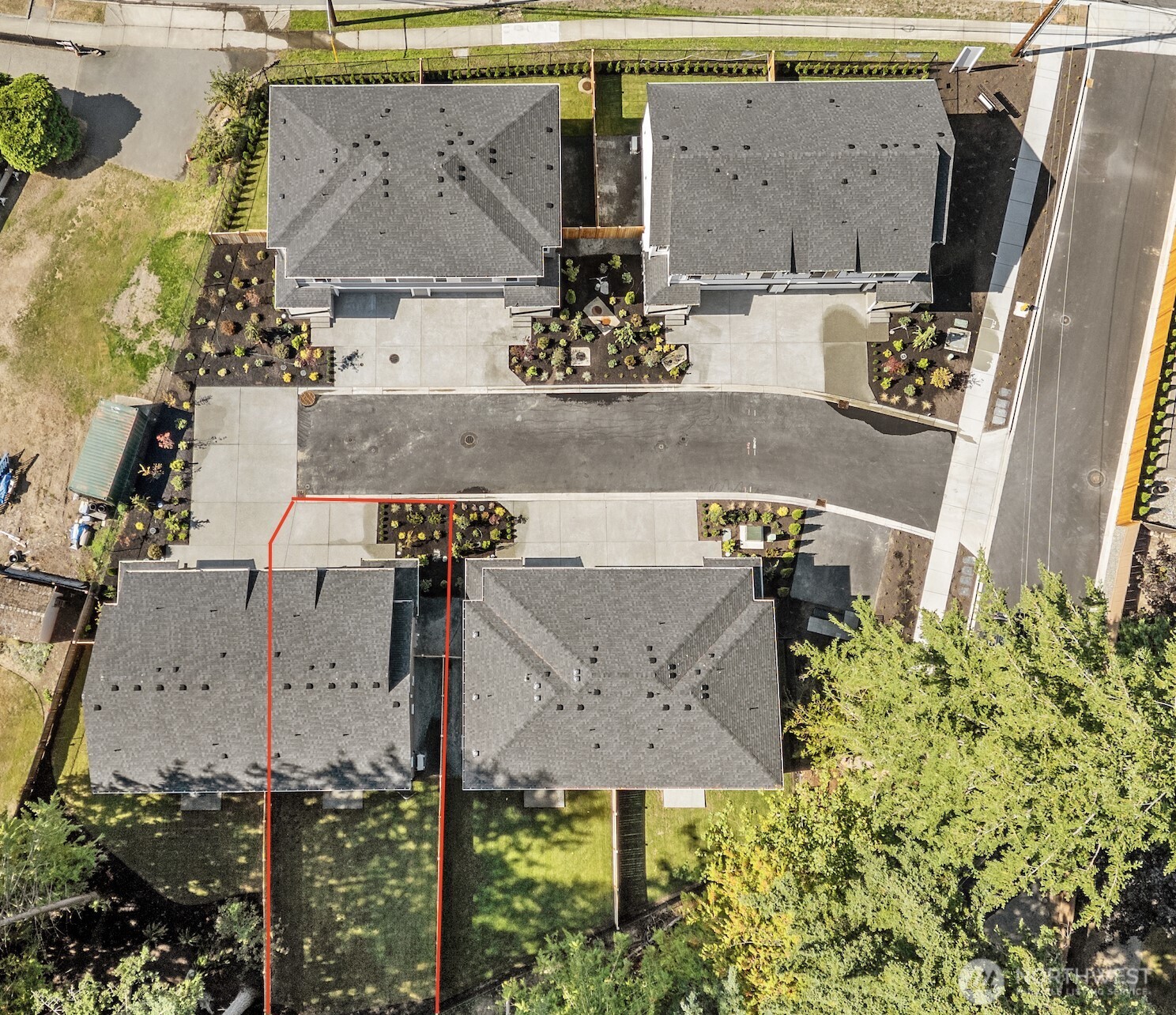 122 169th Place Southwest, Unit A Bothell, WA 98012 - Photo 2 of 29 an aerial view of houses with outdoor space