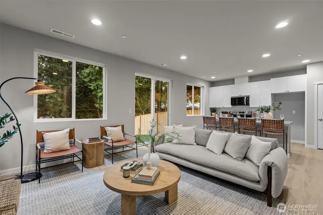 a view of living room with furniture and window
