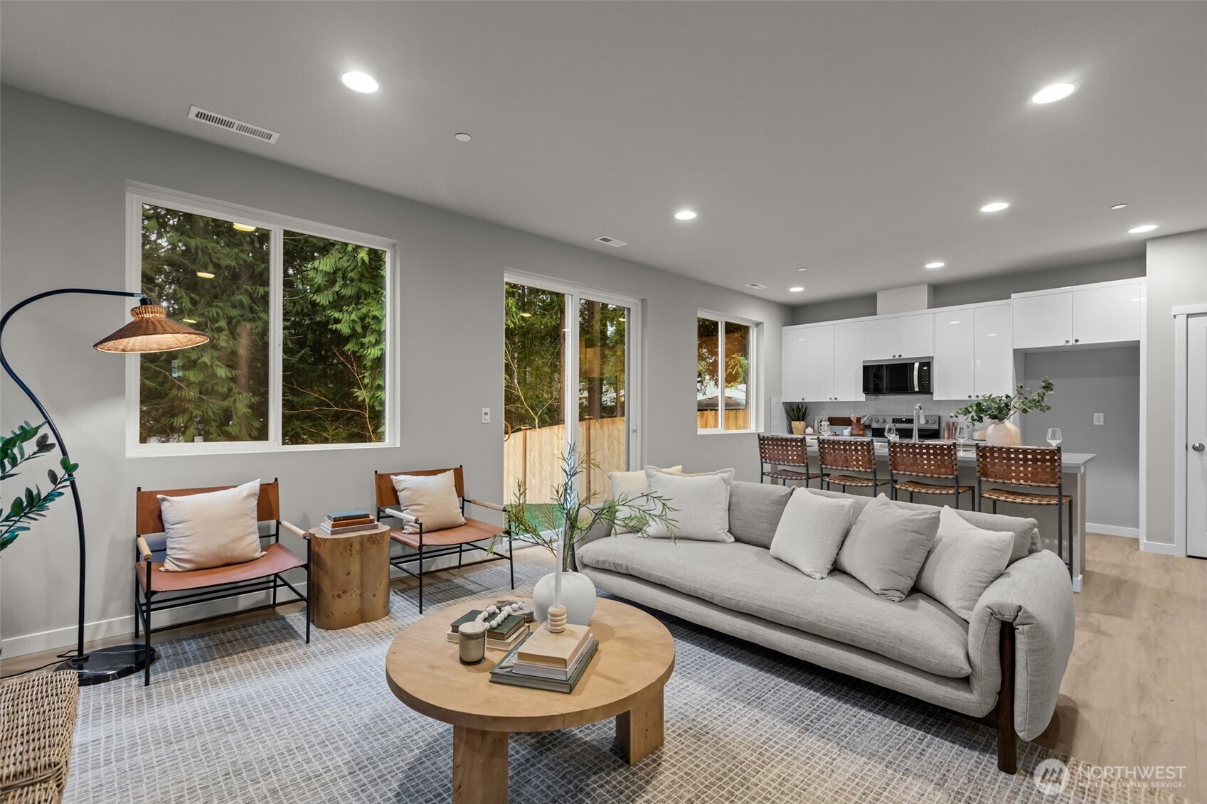 122 169th Place Southwest, Unit A Bothell, WA 98012 - Photo 5 of 29 a living room with furniture and a large window