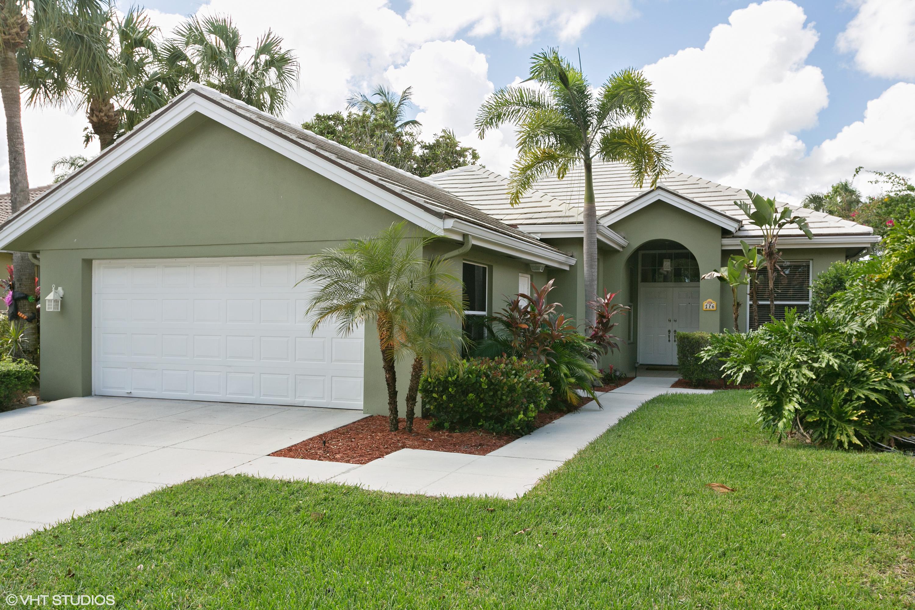 176 Hampton Circle Jupiter, FL 33458 - Photo 1 of 1 01_176HamptonCir_57_FrontView_HiRes
