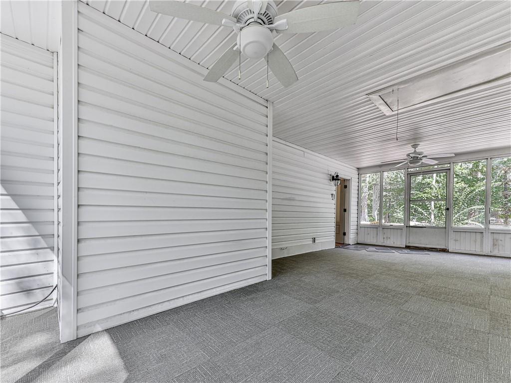 633 Butterworth Road Canton, GA 30114 - Photo 41 of 55 a view of an empty room with a window