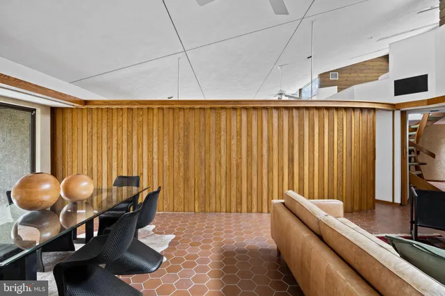 a bathroom with a sink toilet and mirror