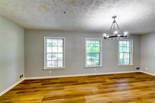 a view of an empty room with window